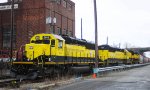 A trio of yellow jackets await its crew to depart west 